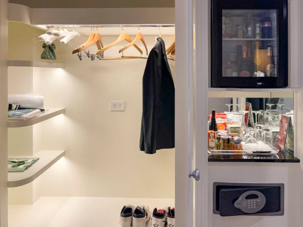 Open closet and mini bar inside our room.