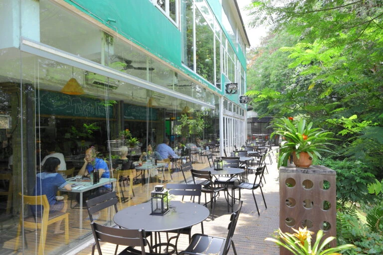 People dine outside of House Restaurant in Dempsey Hill, Singapore.