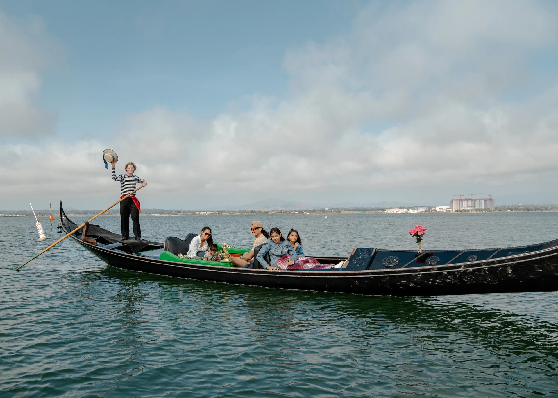 A family rides in a gondola in Coronado.