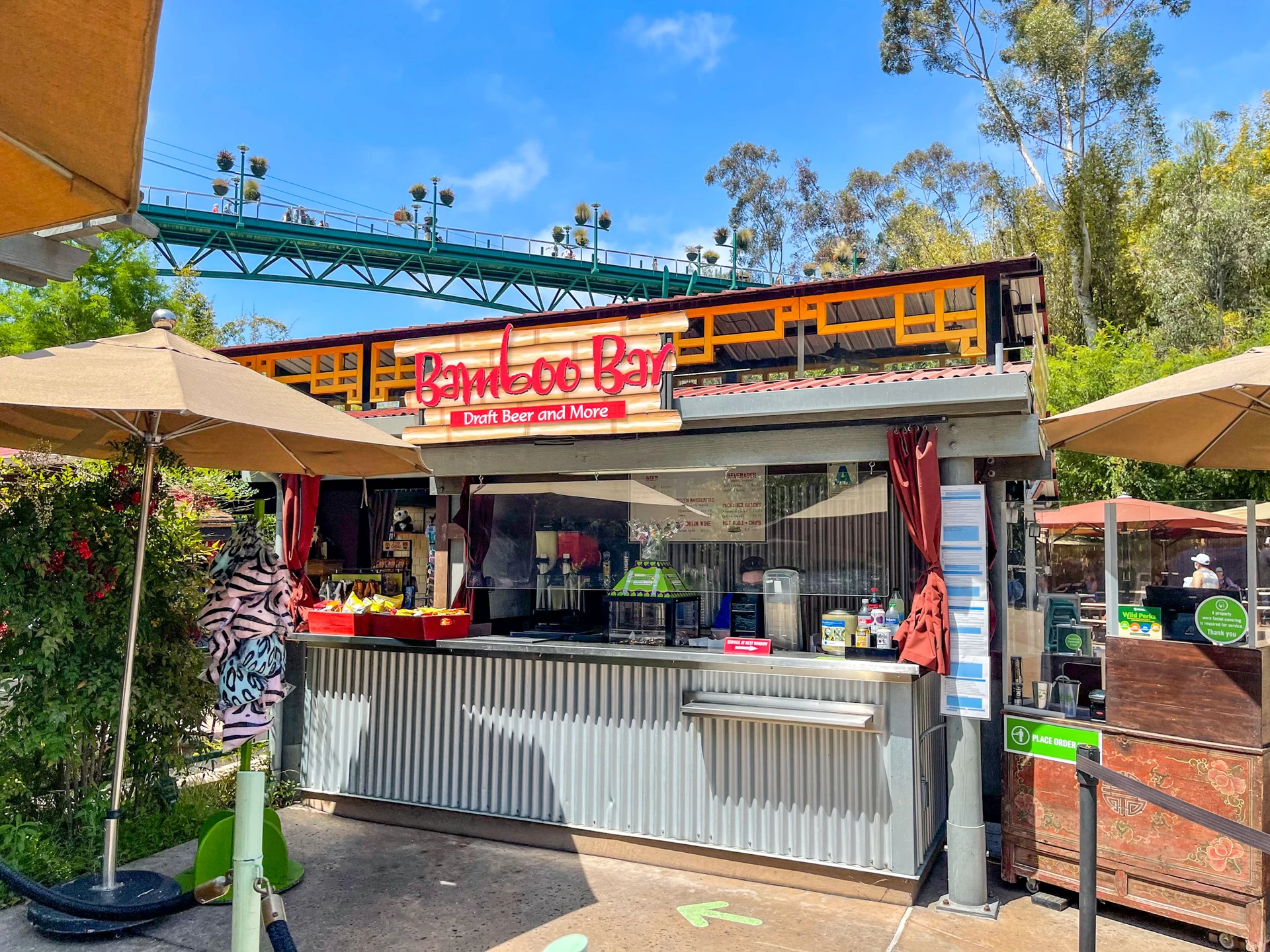 Photo of Bamboo Bar walk-up kiosk that sells beer, micheladas and hot dogs.
