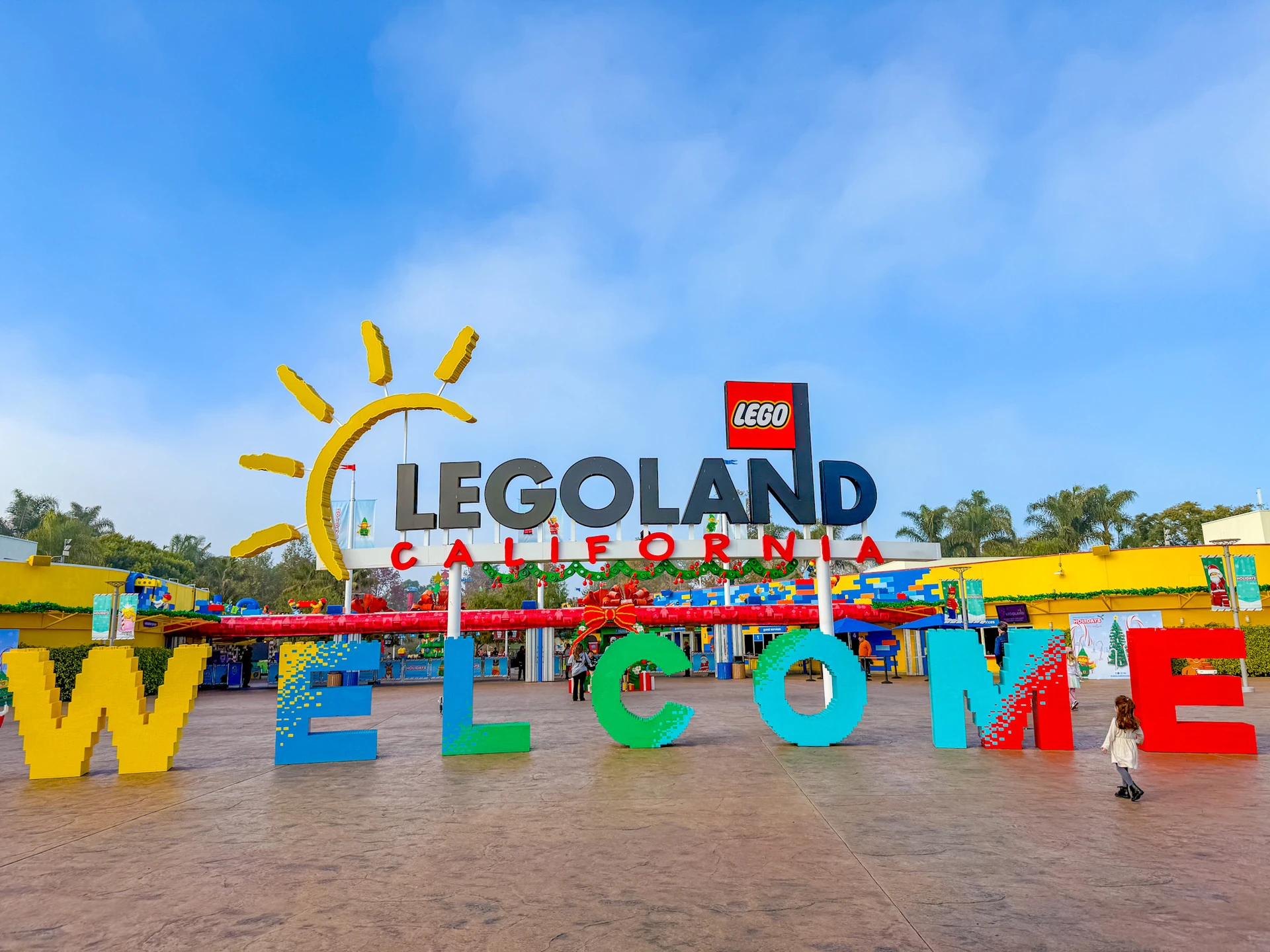 The LEGOLAND entrance and Welcome sign decorated for Christmas.