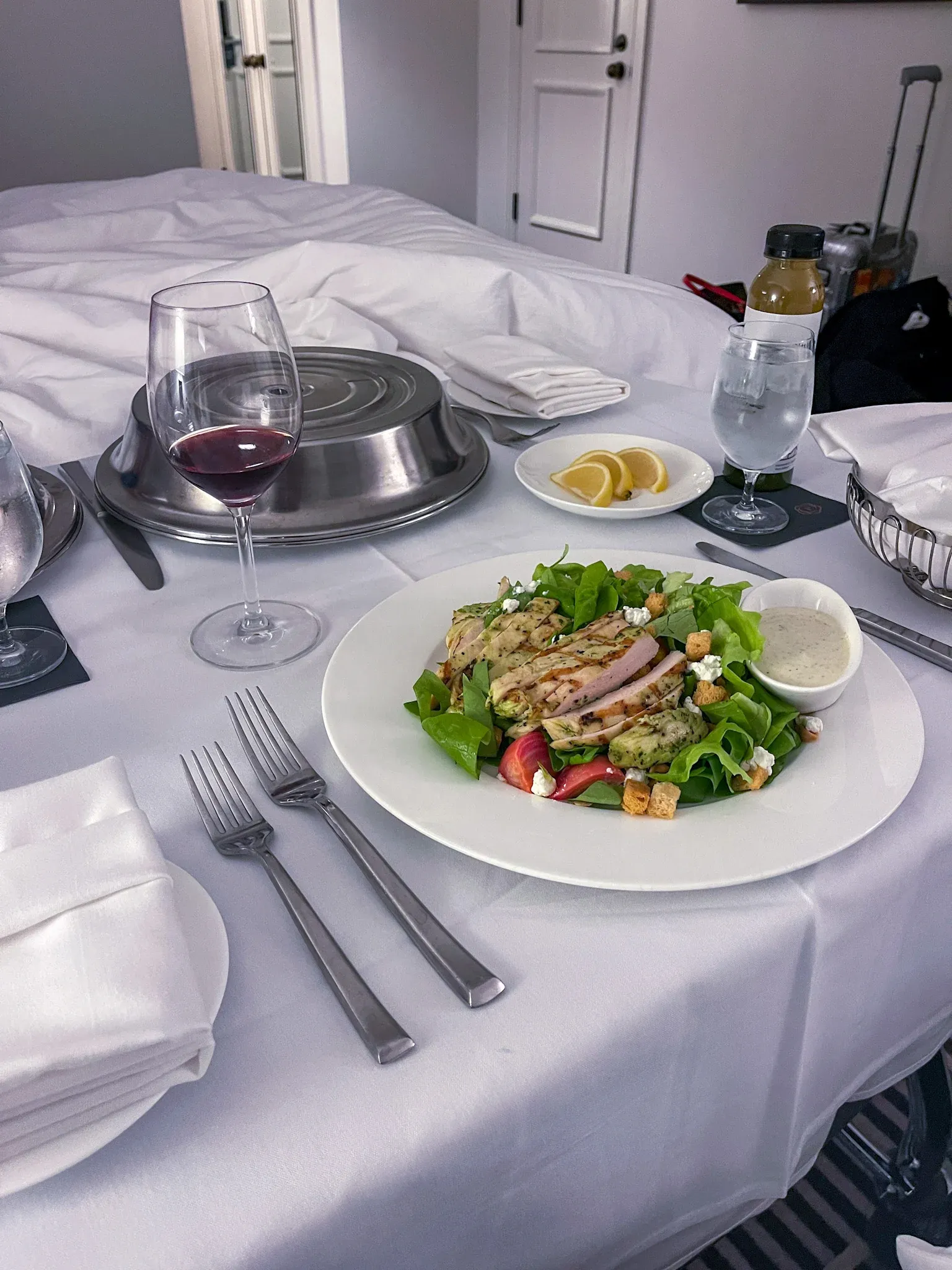 Our dinner room service tray with salad on top.