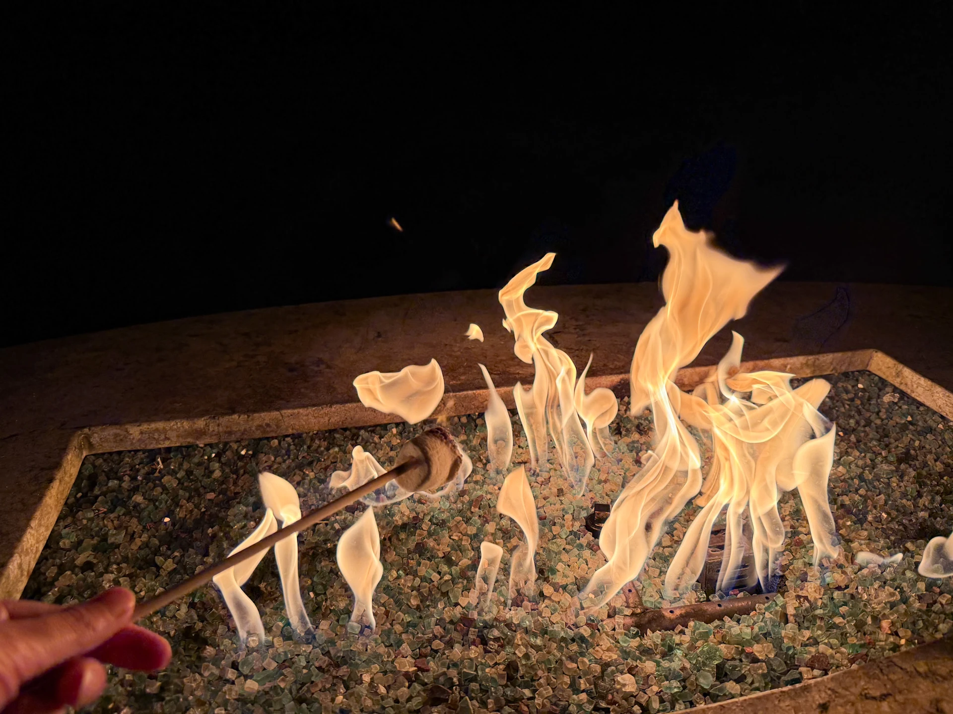 I roast a marshmallow over our fire pit at night.