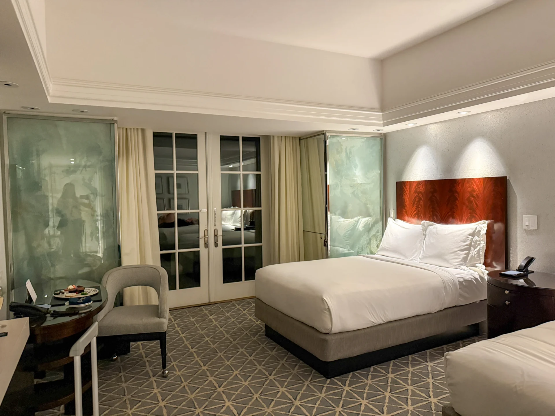 Beachy luxe decor of our two bed room.