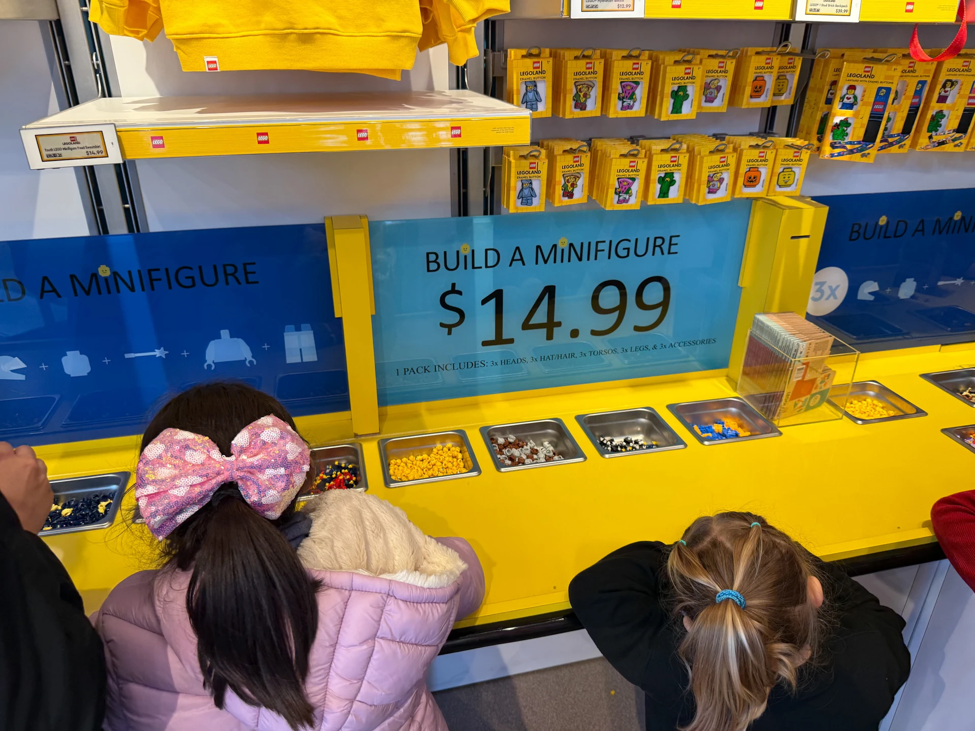 Kids wait to build their own minifigures at LEGOLAND California.