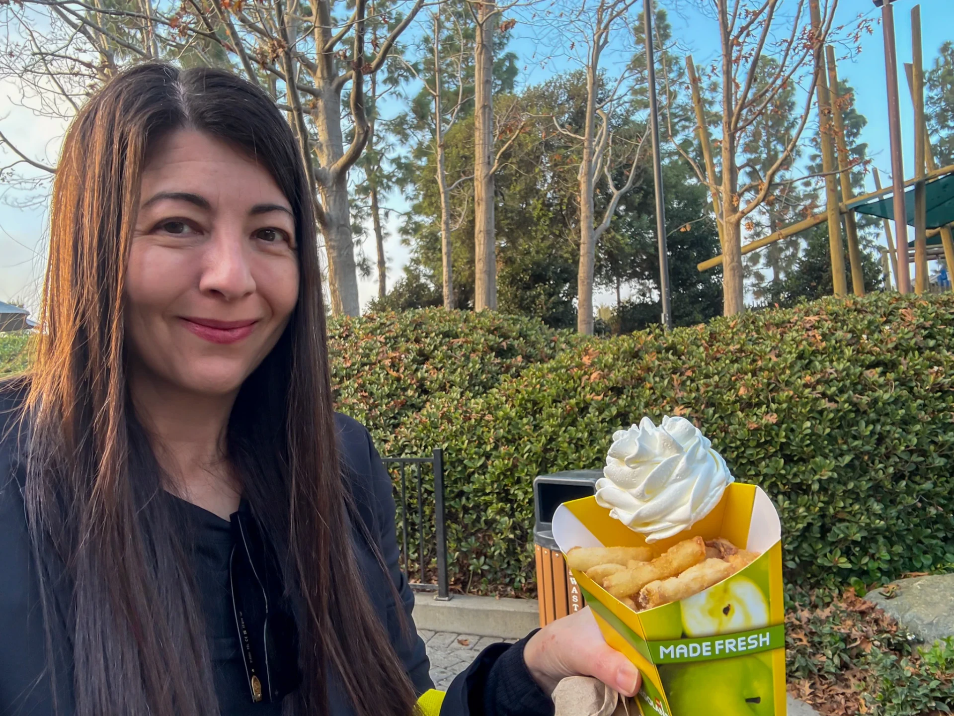 Me holding a box of Granny's Apple Fries at LEGOLAND California.