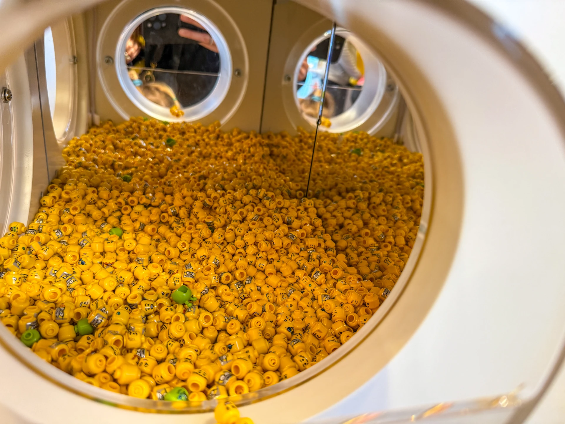 A giant container of minifigure heads in the store you can reach in and grab from.