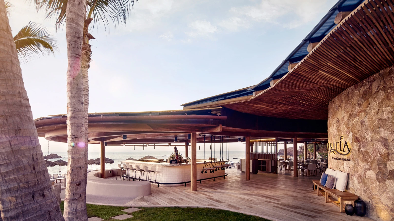 Bahia restaurant bar with its ocean view and wooden swings.