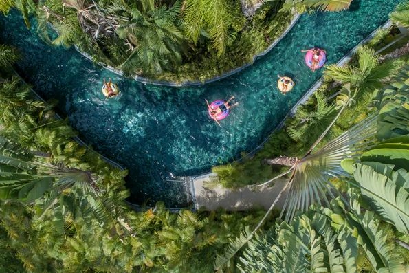 Kids float in innner tubes on the Four Seasons Punta Mita lazy river.