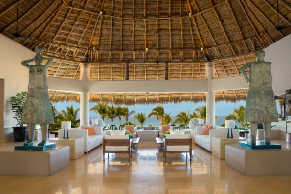 View through the open-air lobby to the ocean.