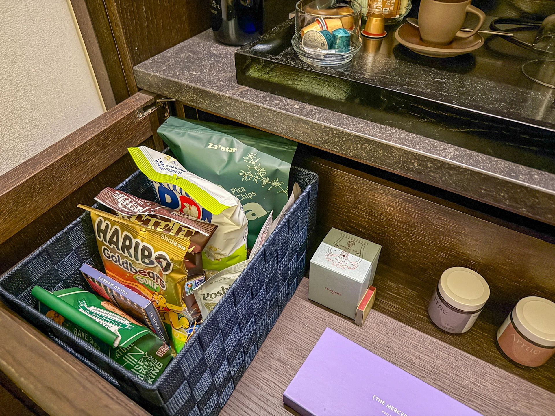 Complimentary snacks in a drawer.