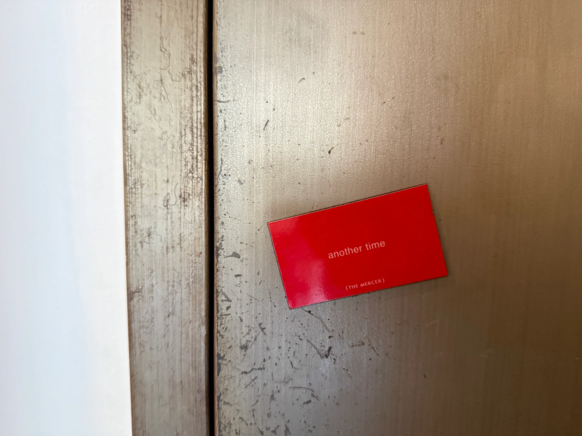 Magnetic Mercer Hotel Do Not Disturb Sign.