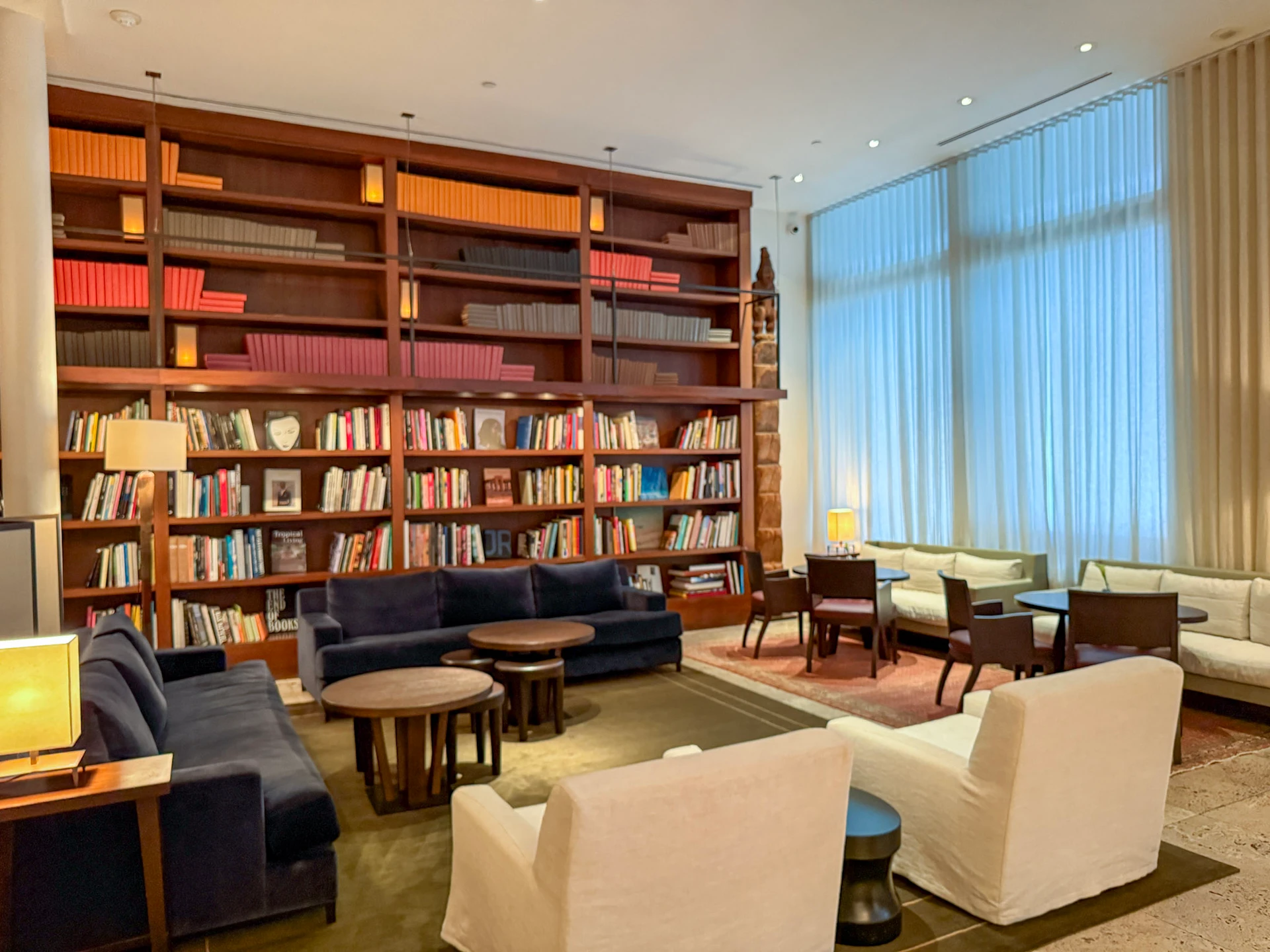 Sofas and bookshelves in the lobby at The Mercer Hotel in NYC's Soho.