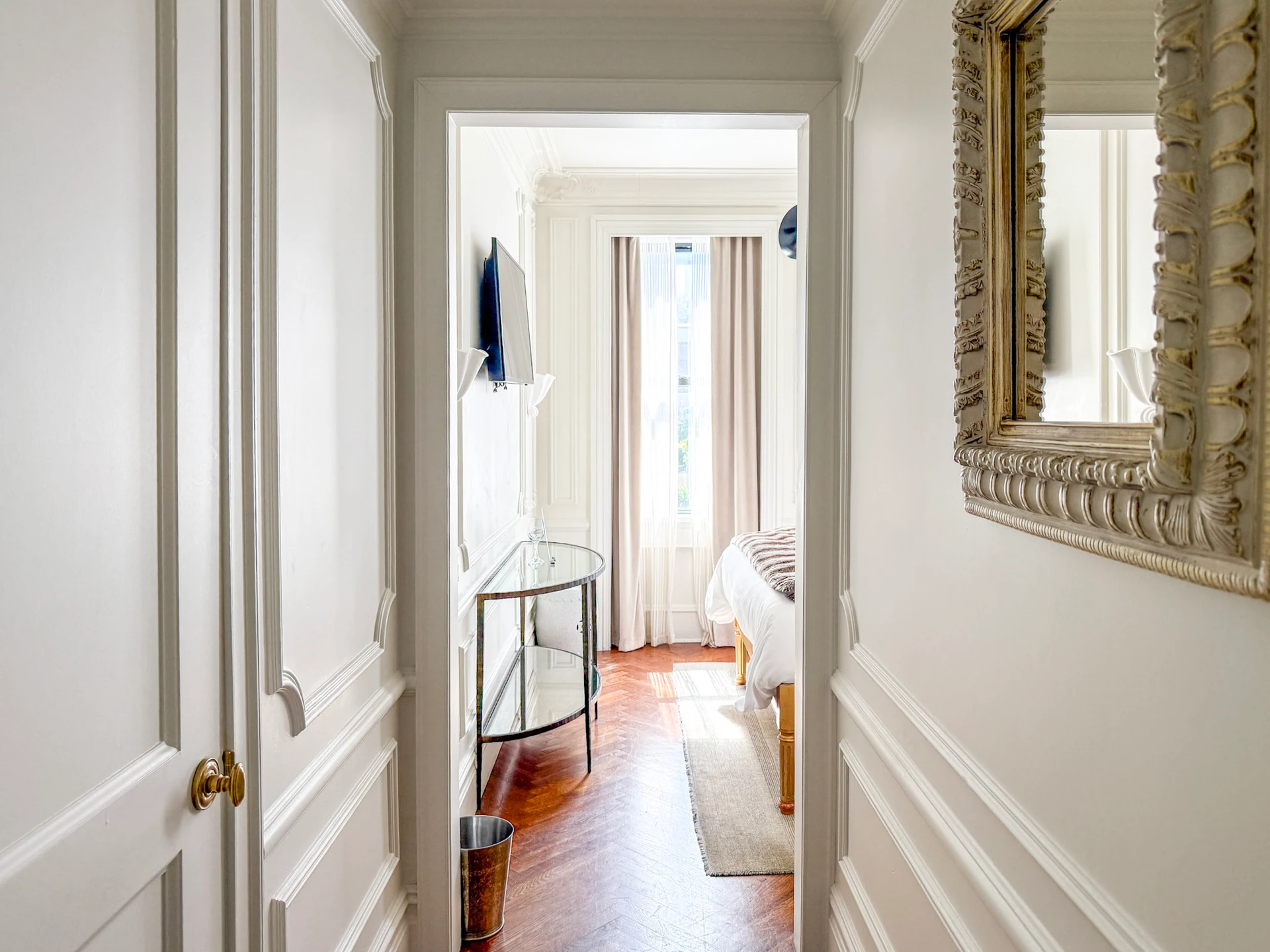 View from the front door down the little hallway to my bed.