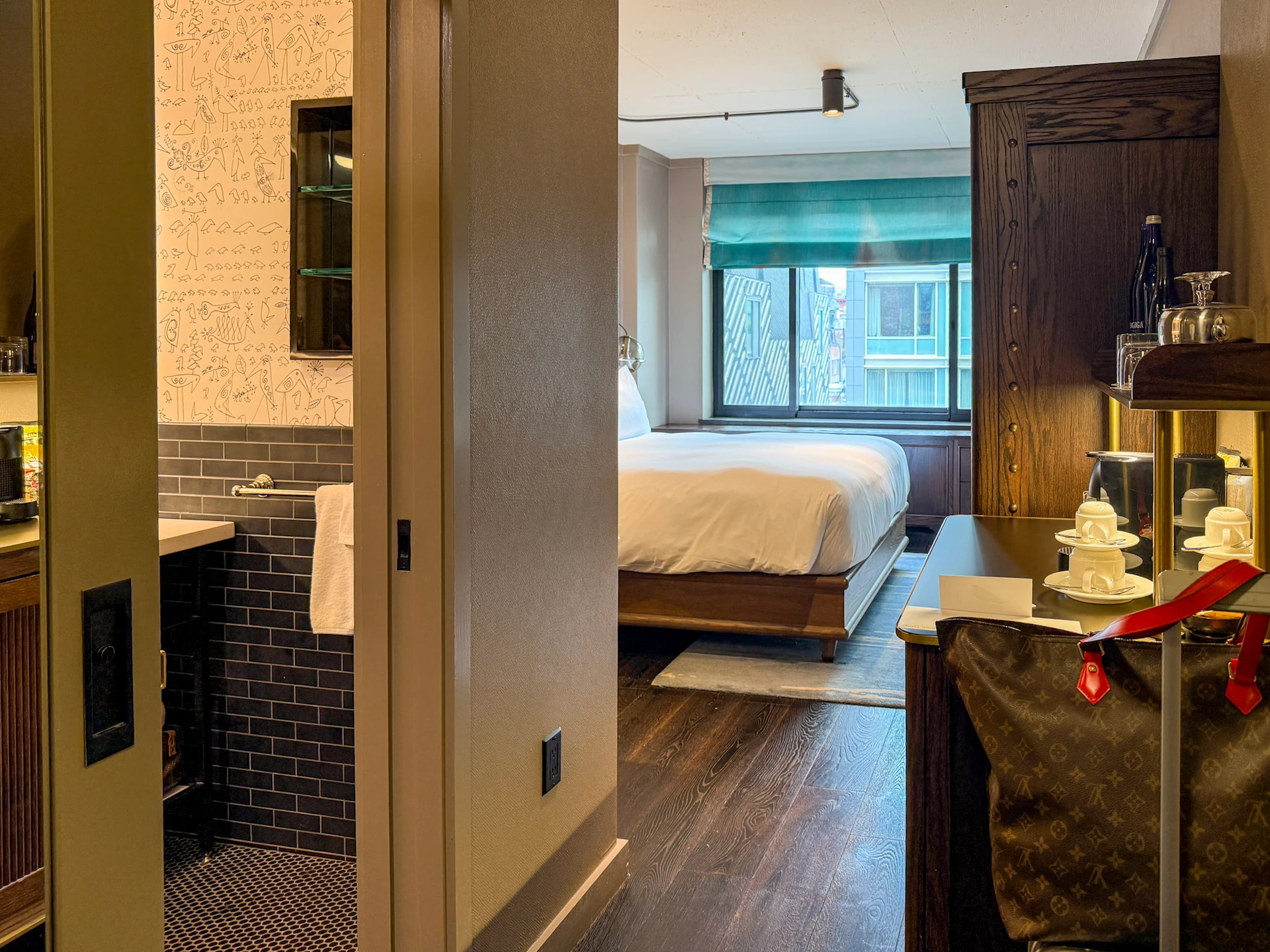 Photo from the entry door of my room looking toward the window to display the room's size.