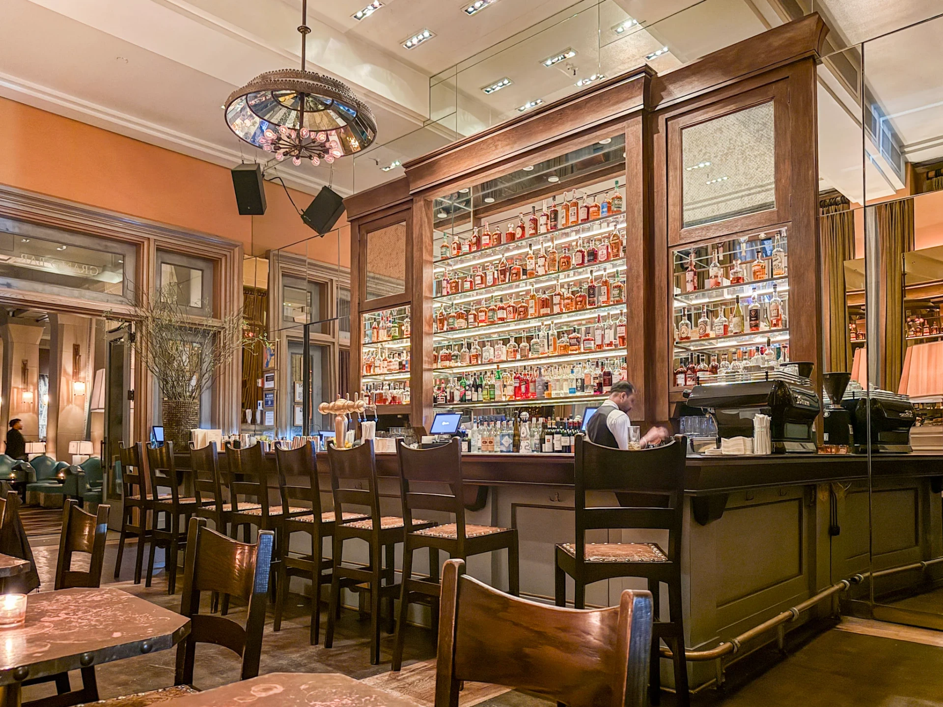 The American whiskey display behind the counter at Soho Grand Bar.