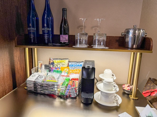 Snacks, water, wine and Nespresso on the mini bar.