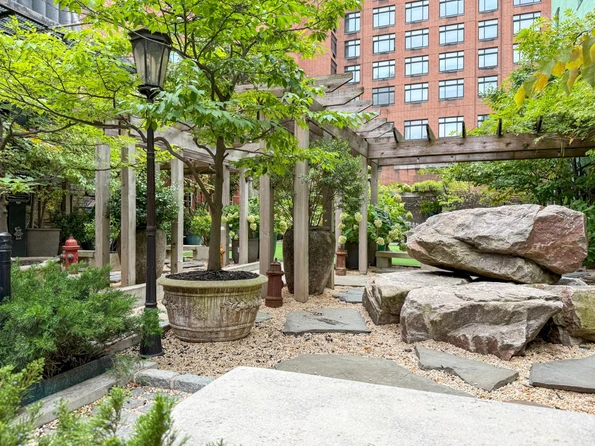 Soho Grand Dog Park zen garden rocks and fake fire hydrants.