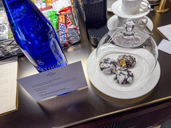 The chocolate cookie and bottled water Virtuoso welcome amenity I received.