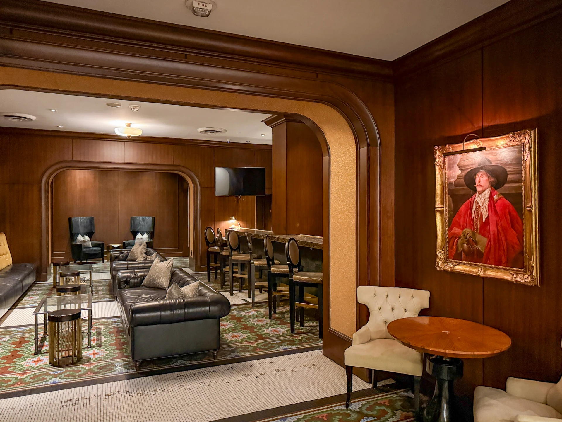St Anthony Bar interior with sofas and barstools.