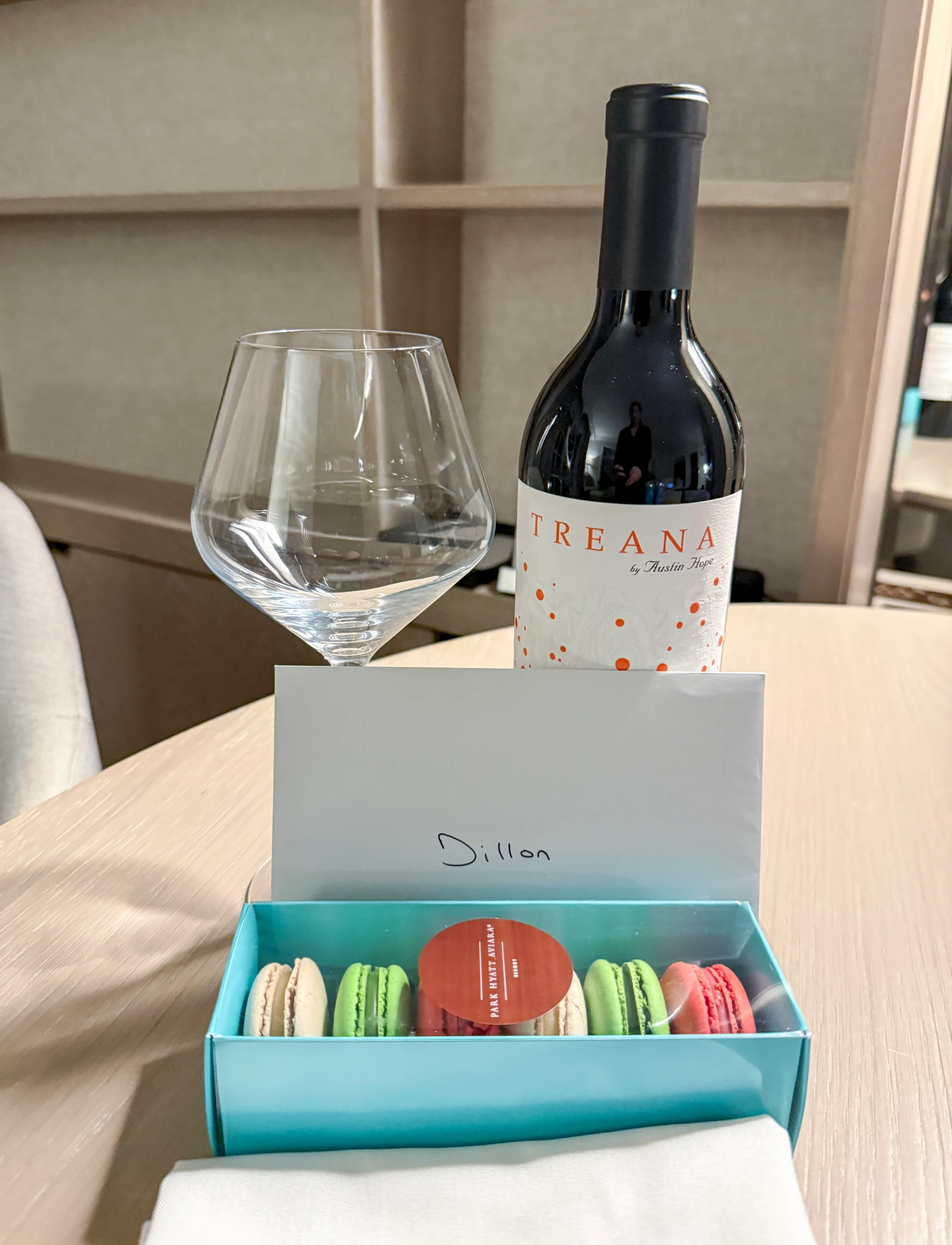 My welcome amenity at Park Hyatt Aviara of red wine and macarons.