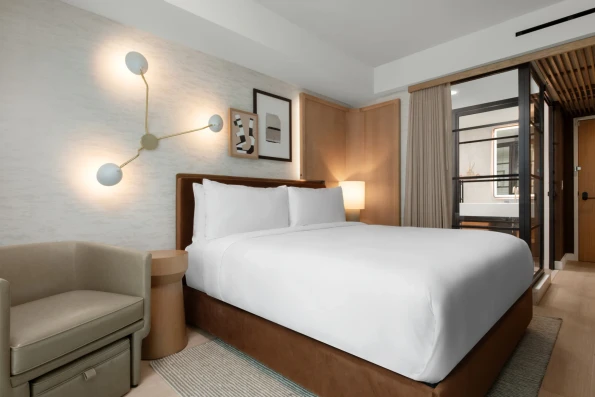 A king room internal facing to the large glass shower.