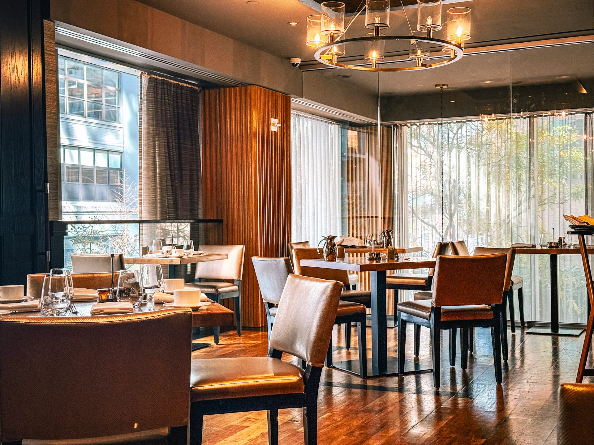 Briefly empty dining tables near where we sat at Mezzanine.