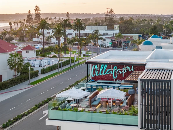 An aerial view of Dive restaurant outdoor seating at The Bower Coronado.