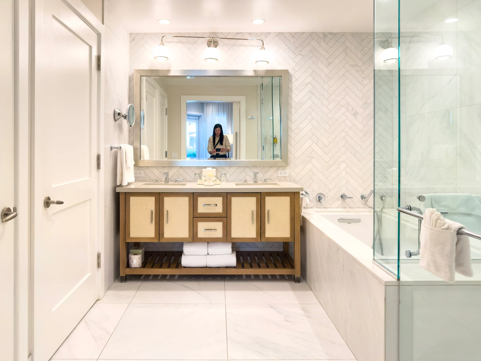 A villa bathroom with tub and shore at Shore House at The Del.