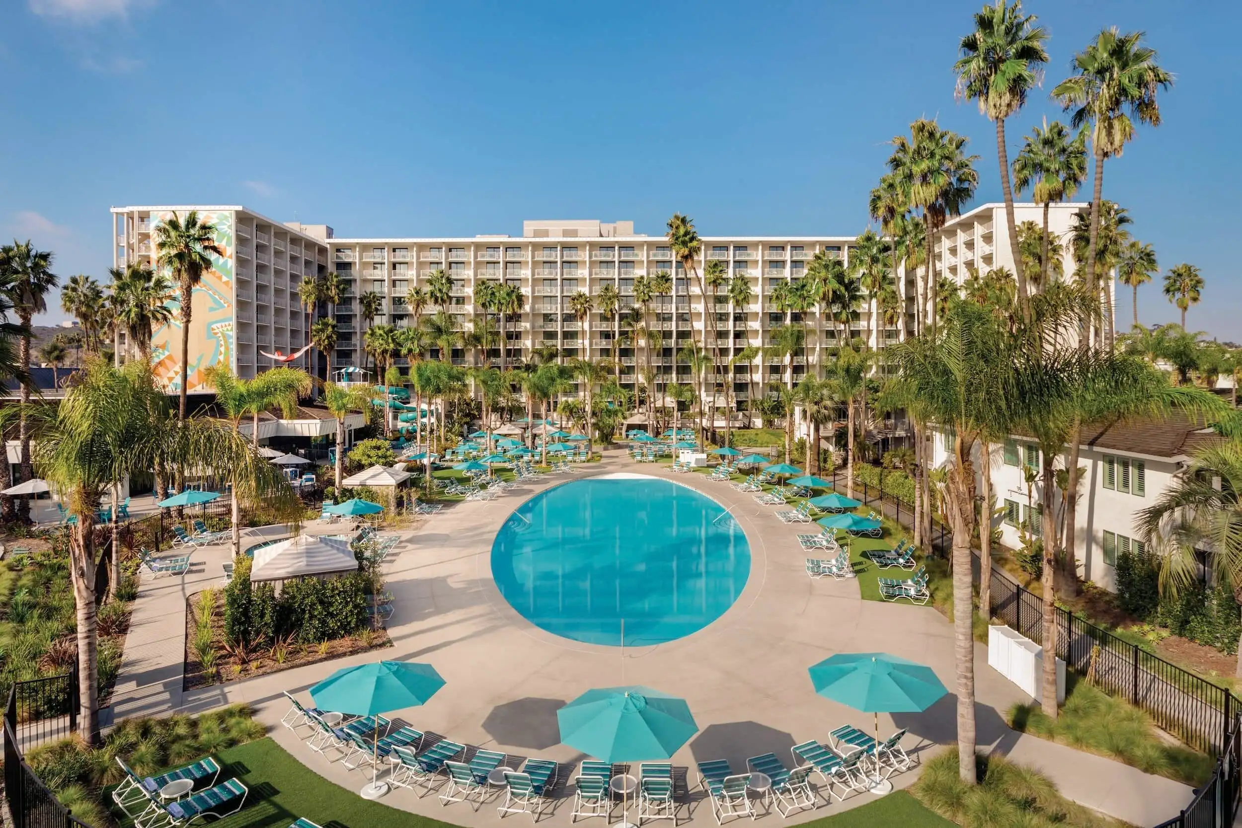 Town and Country Resort in San Diego view over pool to building.