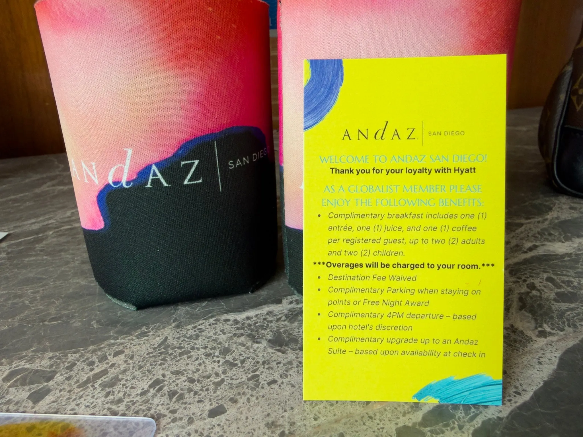 A photo of my Globalist welcome card leaning against a Path water bottle.