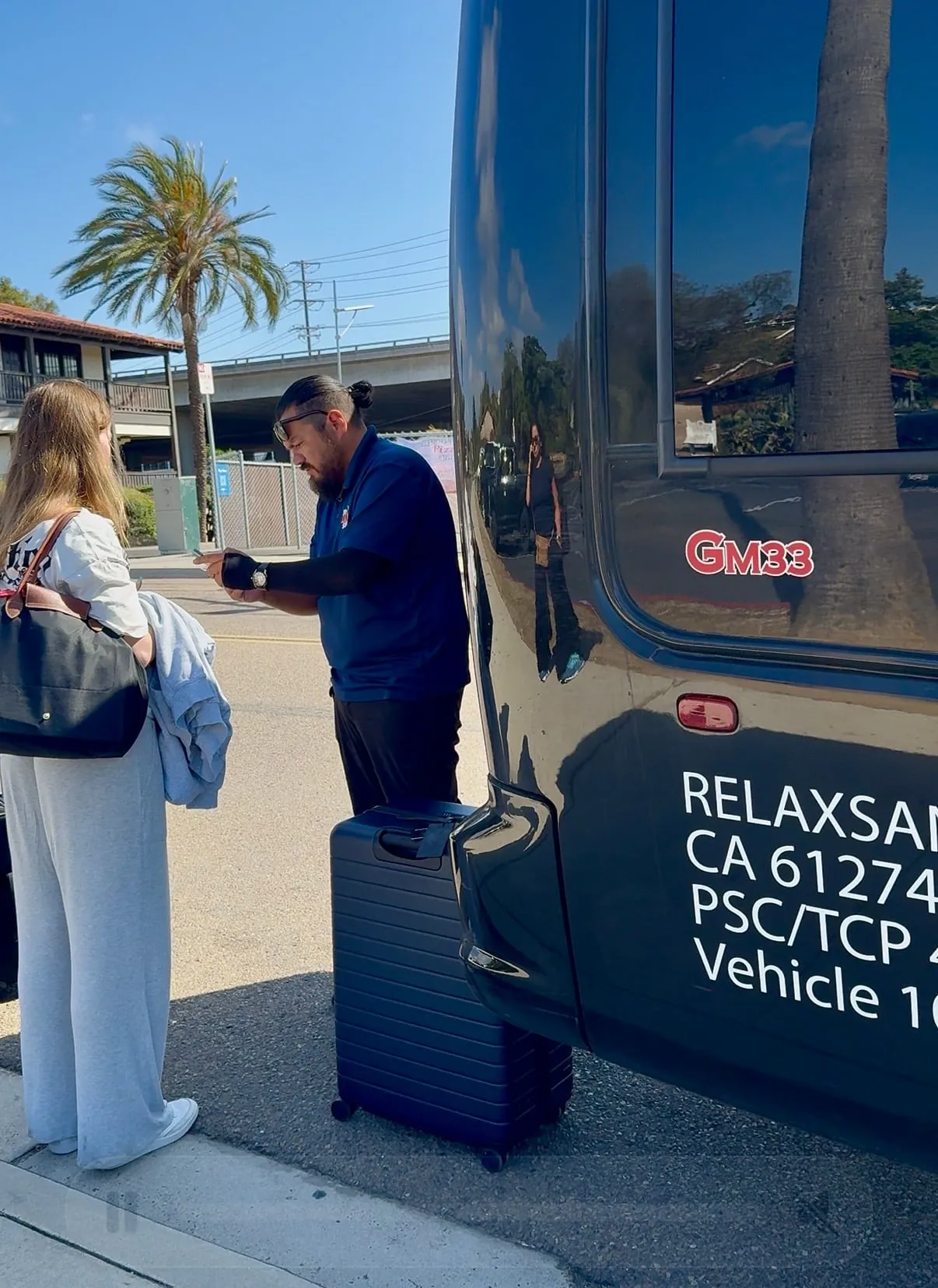 The reLAXsan driver checks tickets and takes bags.