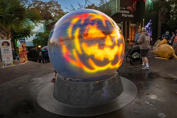 A jack-o'-lantern face on a sculpture at San Diego Zoo's Halloween