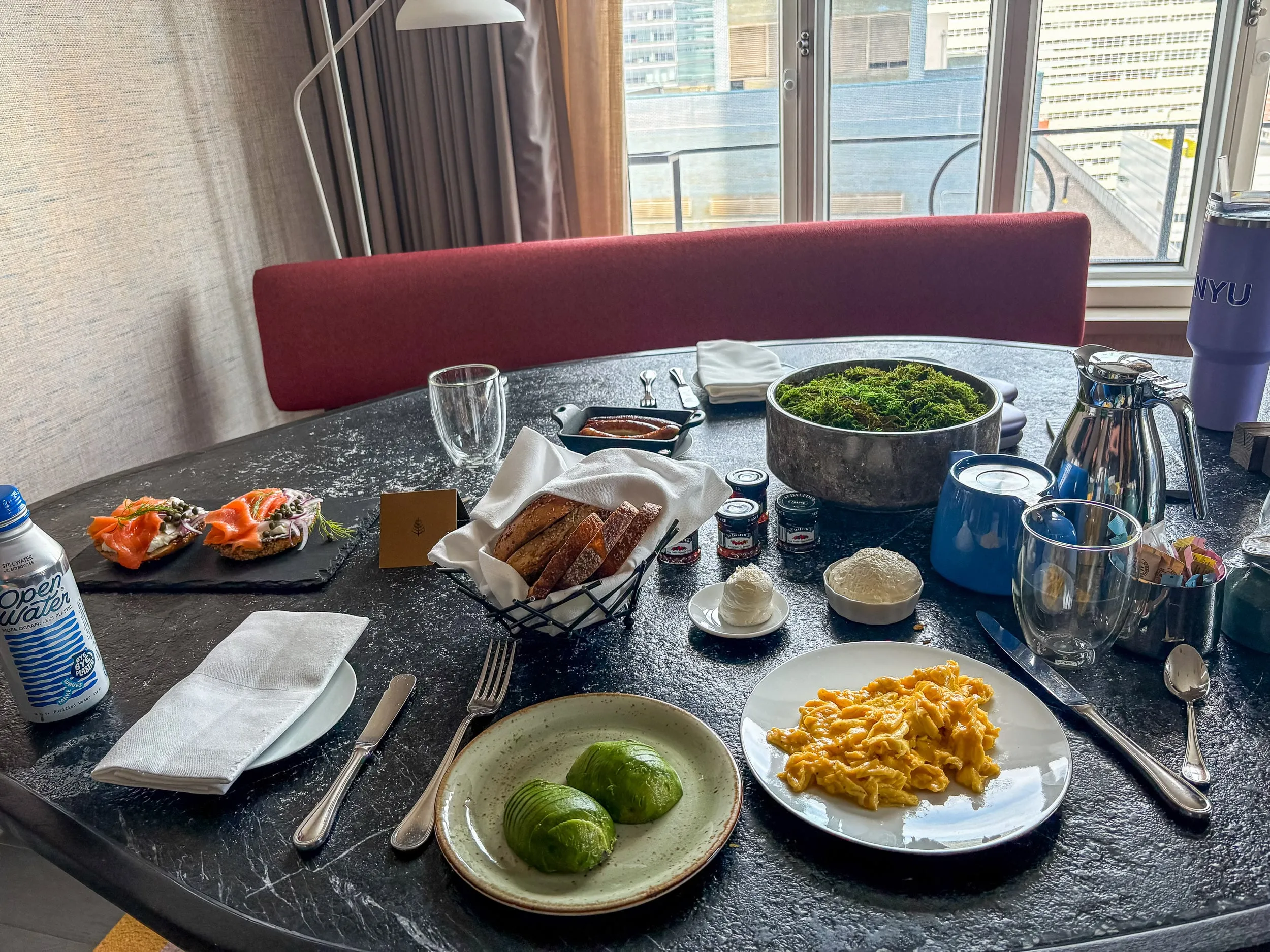 Room service breakfast laid out on the table of our Tribeca Suite.