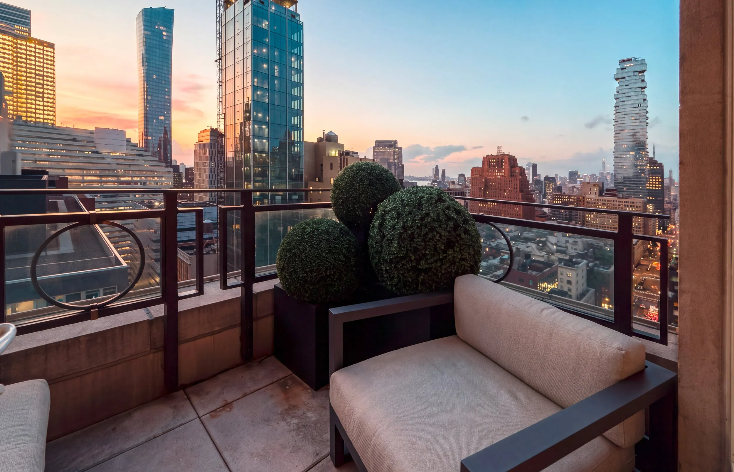 The Tribeca Suite terrace city view at golden hour.