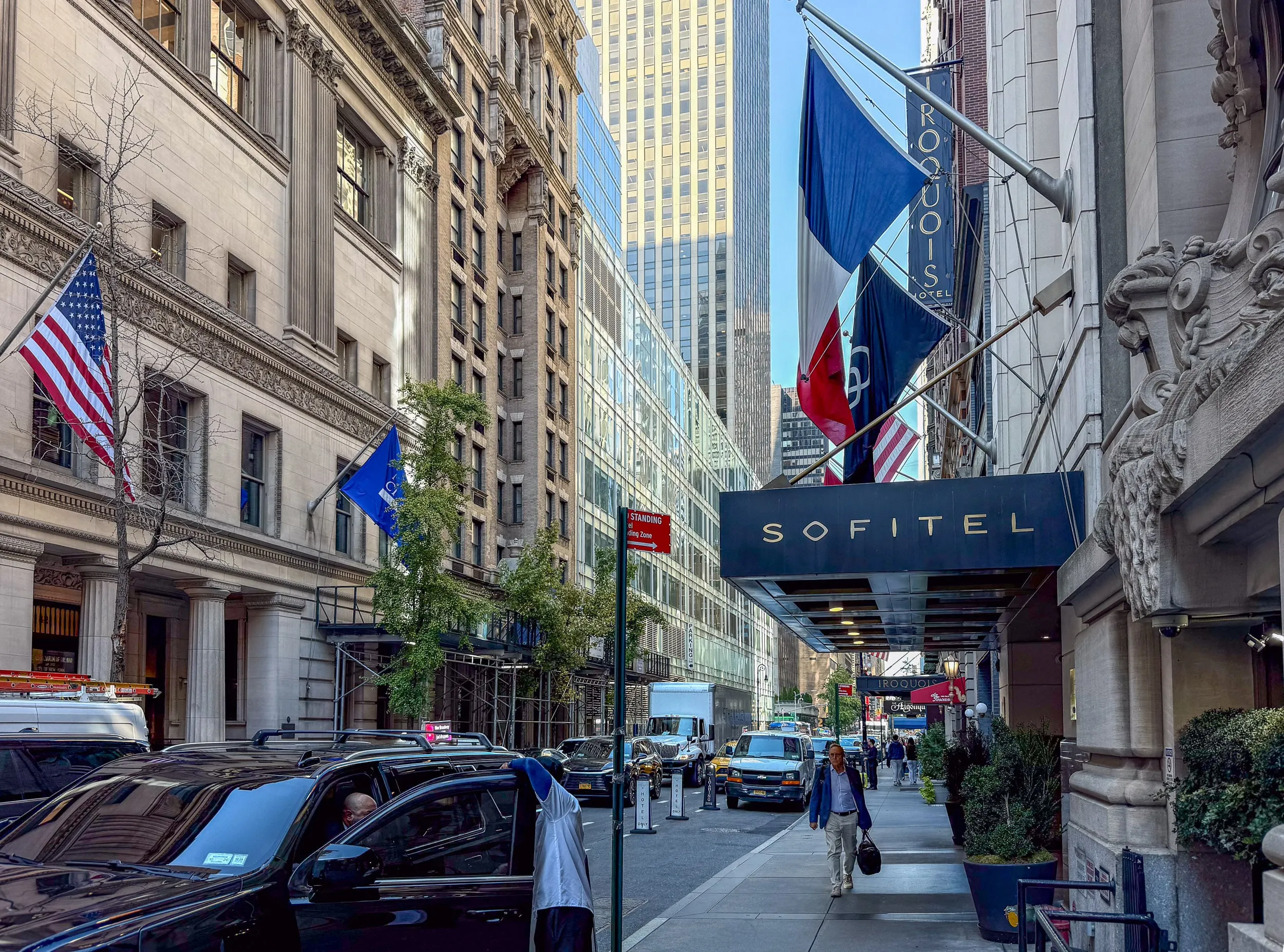 The entrance sign on 44th Street to Sofitel New York City on a sunny day.