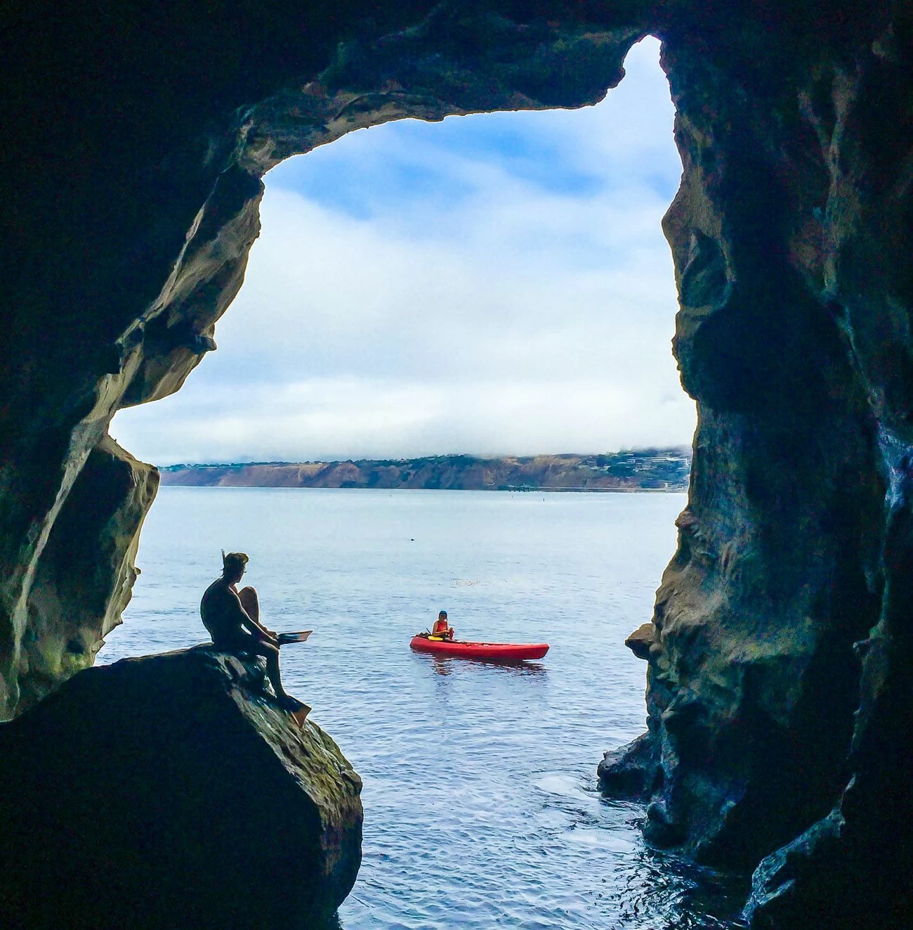 View to the ocean from the platform inside Sunny Jim Sea Cave, a popular La Jolla San Diego area attraction.