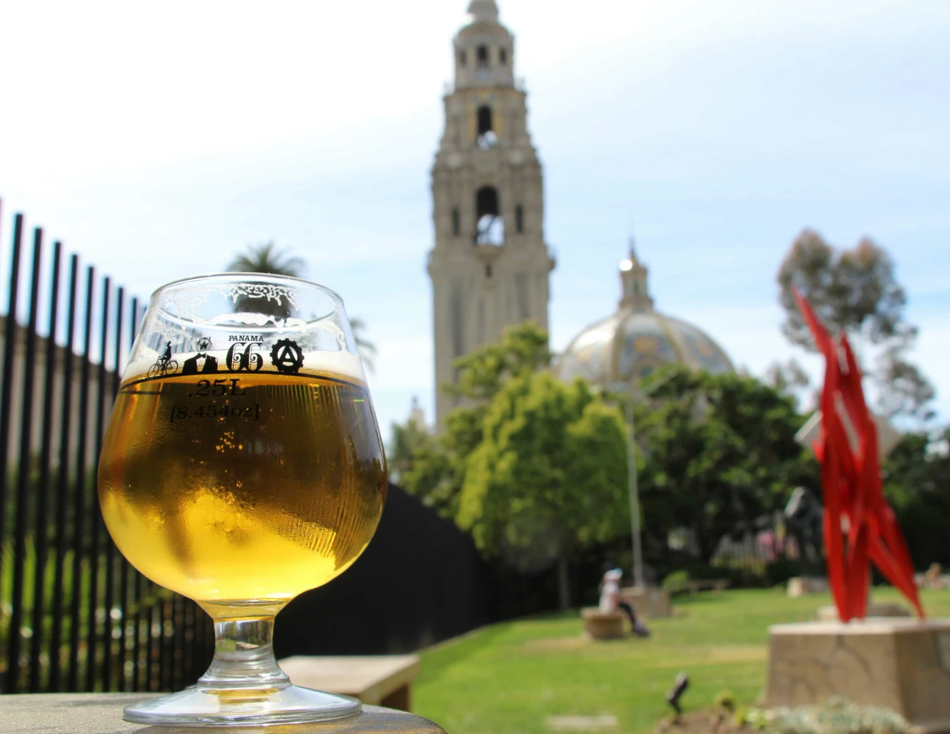 Craft beer on a table overlooking the sculpture garden at Panama 66