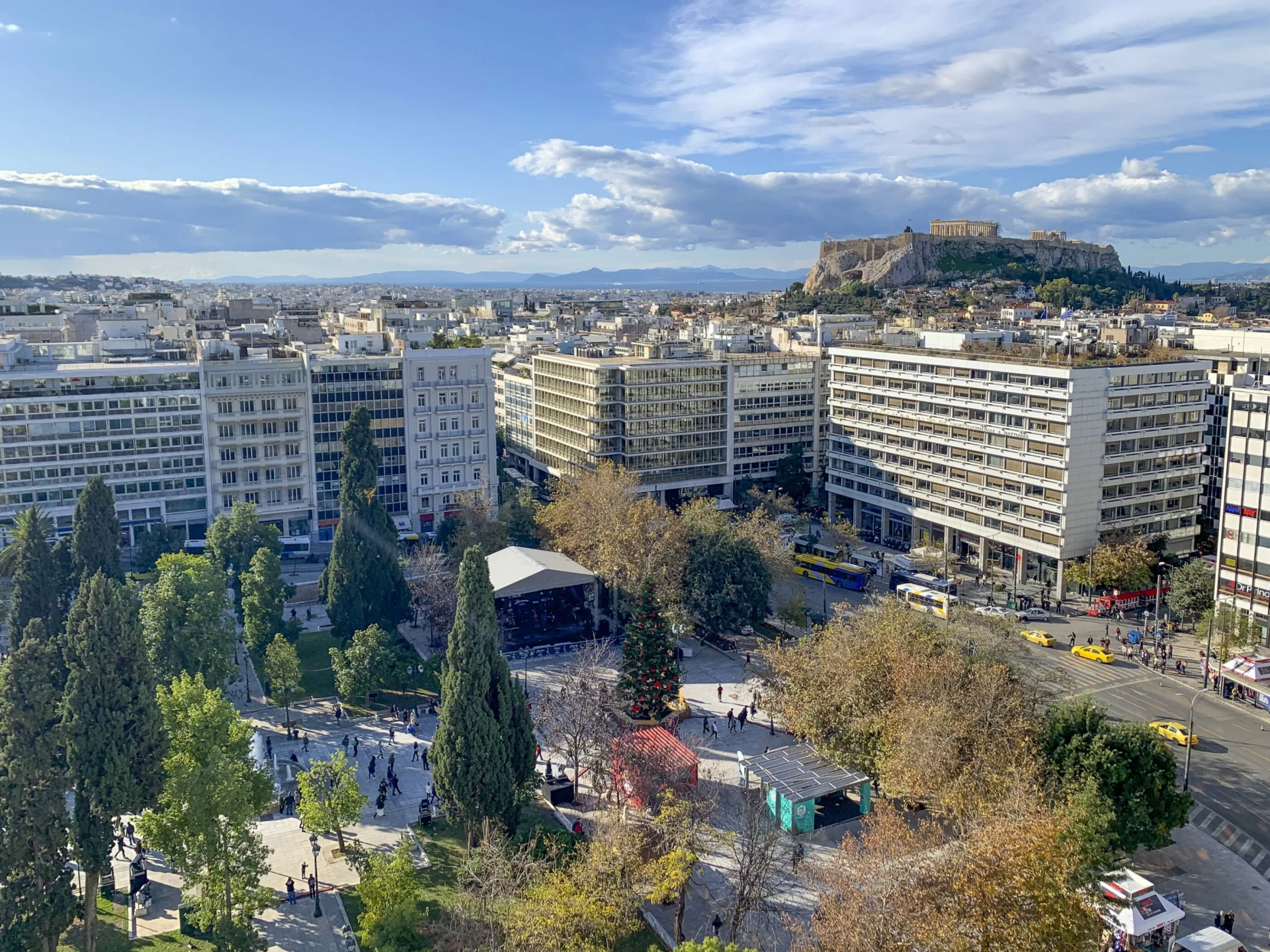 View over Syntagma Square from the GB Roof Garden Restaurant over to the Acropolis.