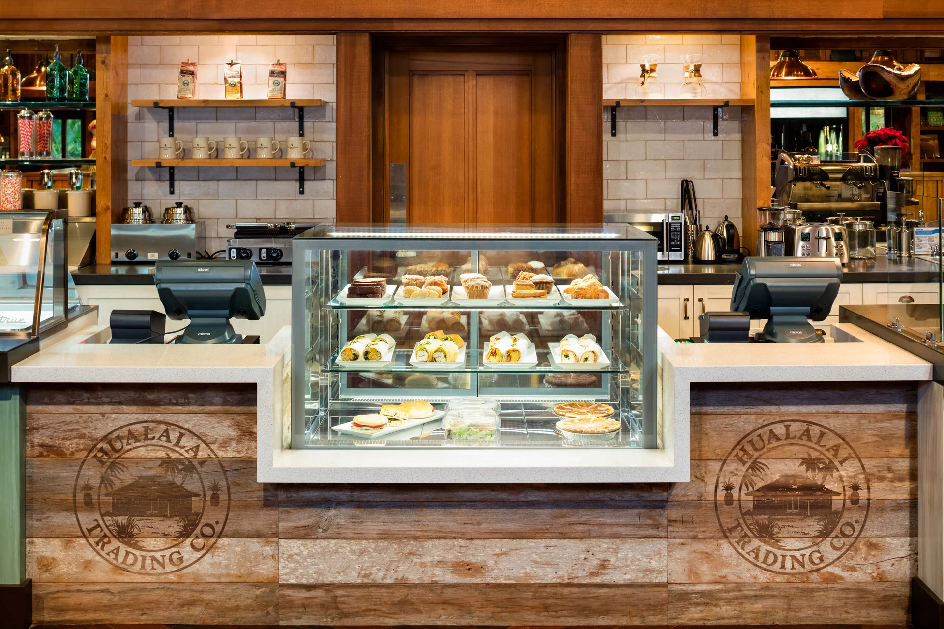 A display case with pastries and sandwiches at Hualalai Trading Company.